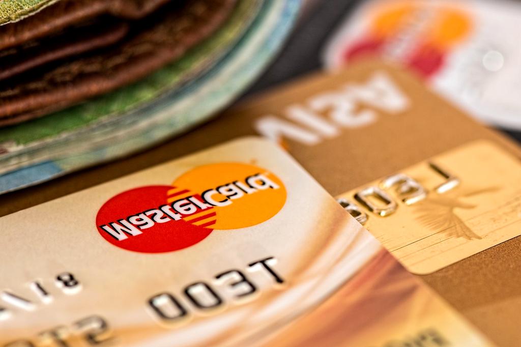Credit card and wallet on a desk